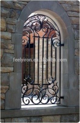 wrought iron arched window grill